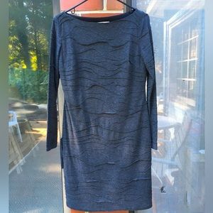 Longsleeved knit dark gray dress w/undulating “waves”pattern. Sz 8. FormFitting.